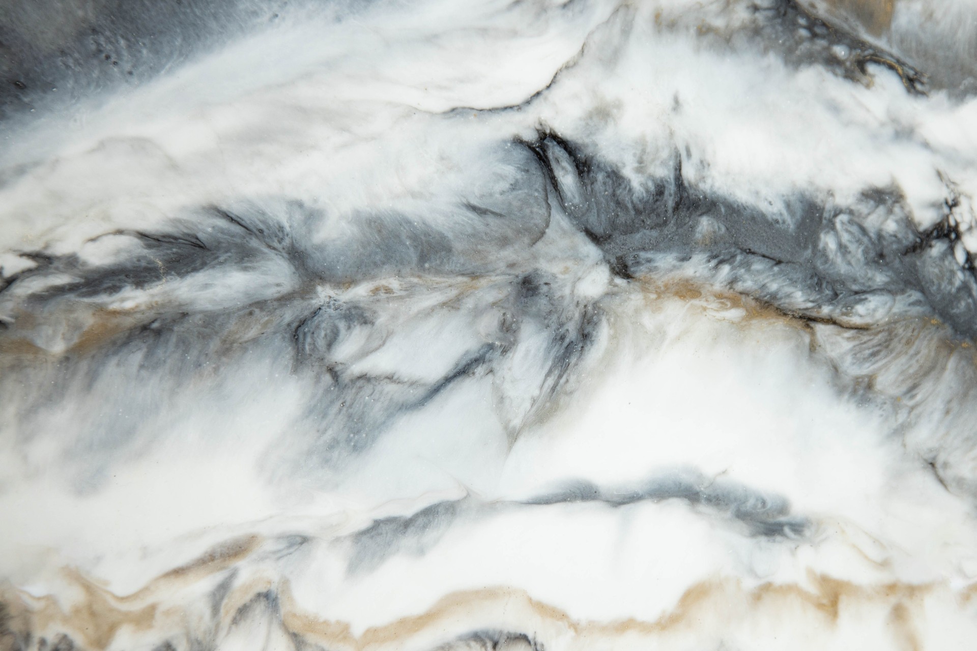 Abstract painting with epoxy resin. Marble streaks of Grey,white and gold. Abstract modern with streaks liquid background for design.
